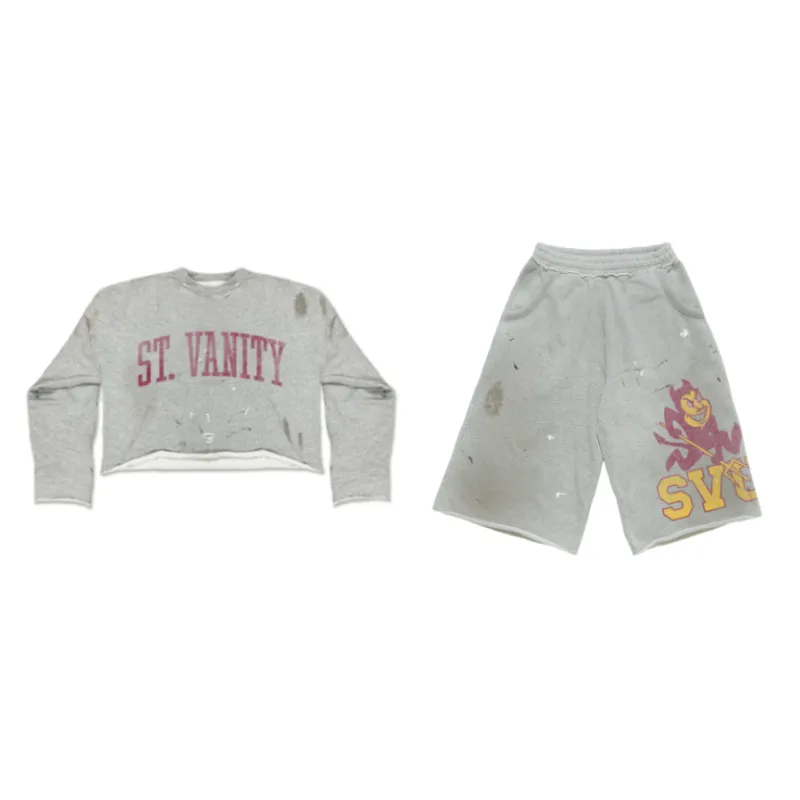 Saint Vanity Distressed ST. VANITY Letter Cropped Long Sleeve Top