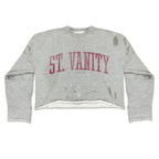 Saint Vanity Distressed ST. VANITY Letter Cropped Long Sleeve Top